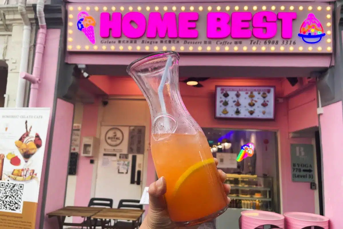 The neon pink Home Best storefront on Pagoda Street